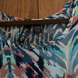 Multi colored high-low dress.